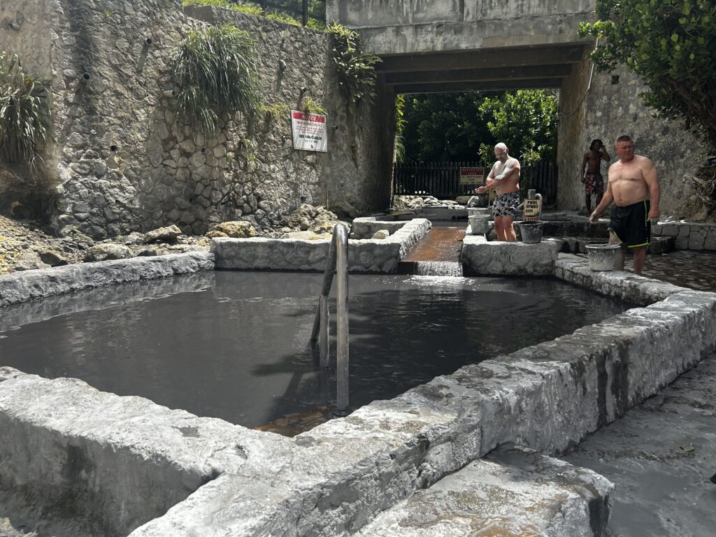 stone pools holding black spring water from Sulphur Springs St. Lucia