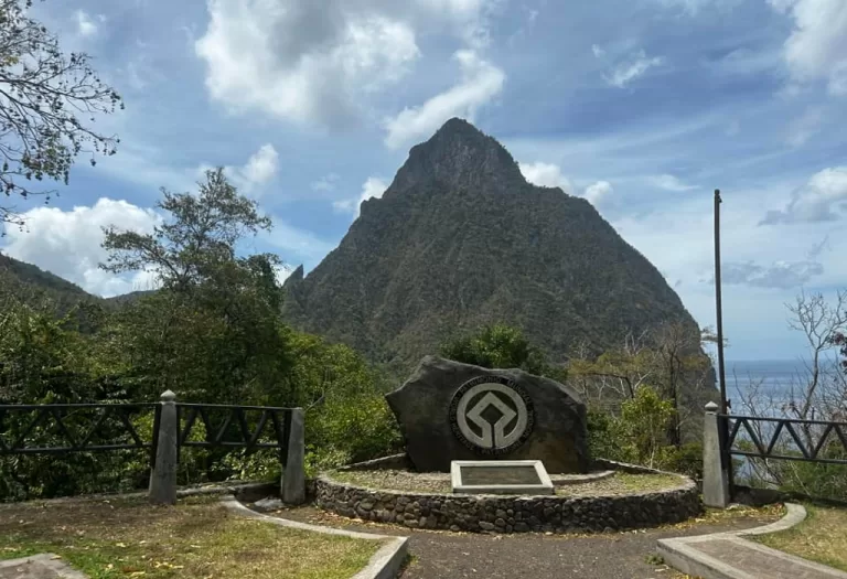 A plaque in front of the Pitons in St. Lucia