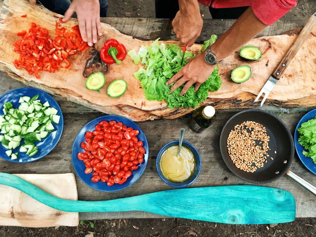 a selection of fresh foods being chopped