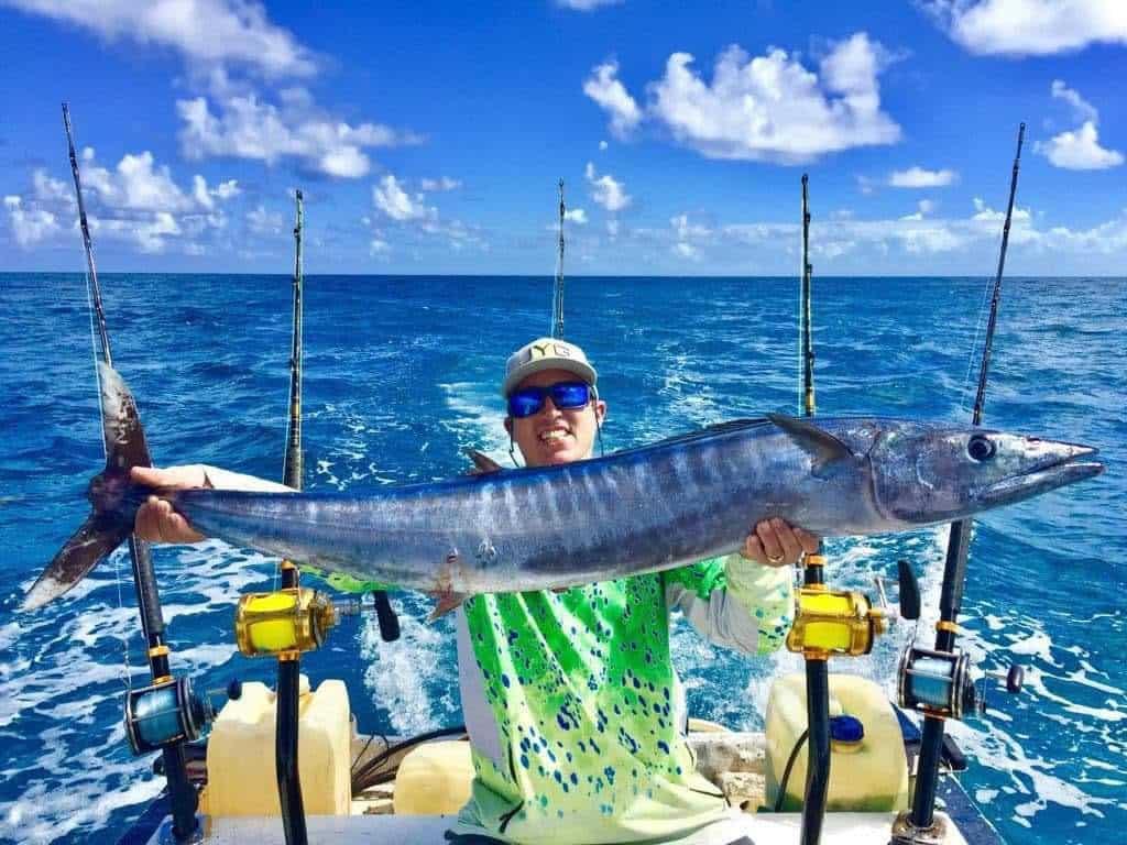 a man holding a big fish