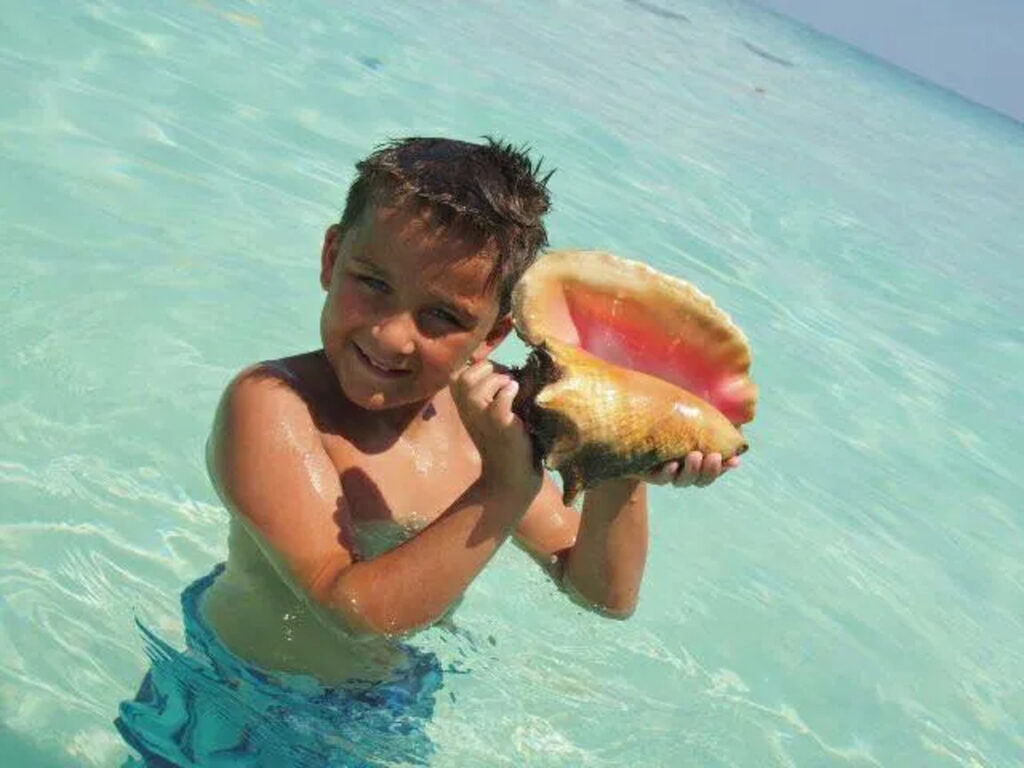 boy with conch shell