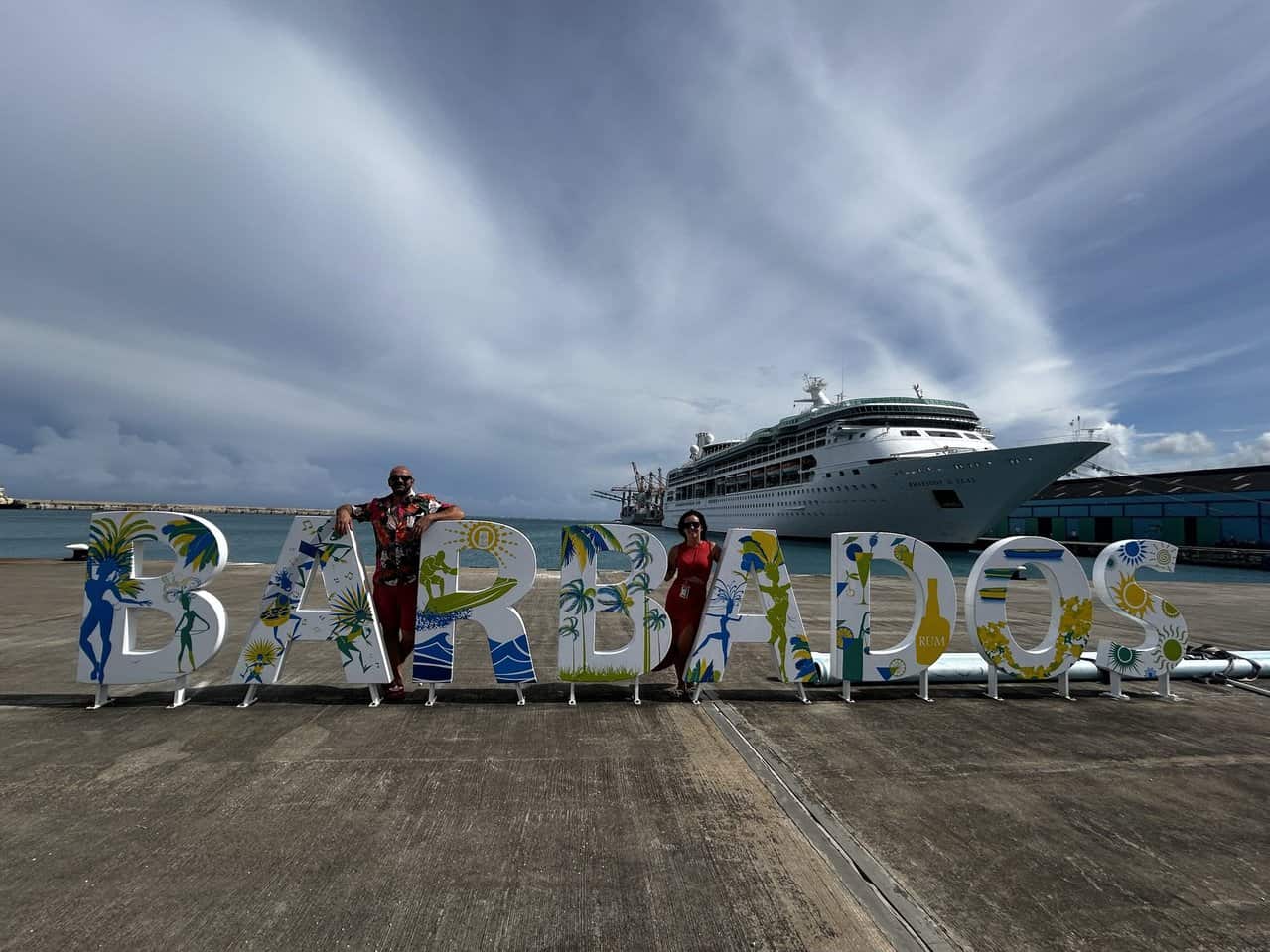 Barbados sign with cruise ship in the background